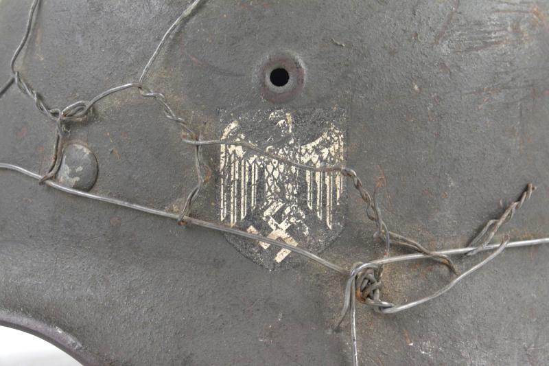 German WH M40 SD Combat Helmet with Battle damage and Half Wire Basket