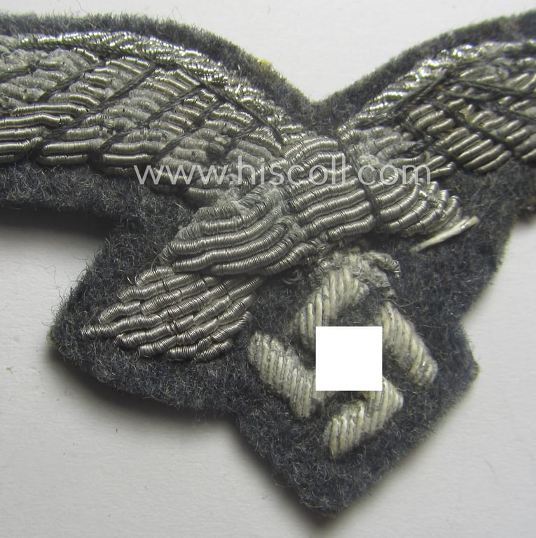 WH (Luftwaffe) officers'-pattern breast-eagle (ie. 'Brustadler für Offiziere der Luftwaffe') being a neatly hand-embroidered example of the: 'Extra Qualität' that comes in a moderately used- (ie. carefully tunic-removed-), condition