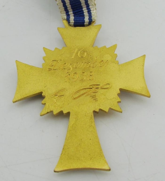 Mother’s cross in gold with box ( Klamt und Söhne )