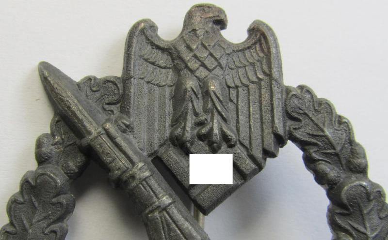 'Infanterie-Sturmabzeichen in Silber' (or: silver-class IAB) being a clearly maker- (ie. 'GWL'-) marked, zinc- (ie. 'Feinzink'-) version ie. molded-'variant' as was procuded by the: 'Gebrüder Wegerhoff'-company