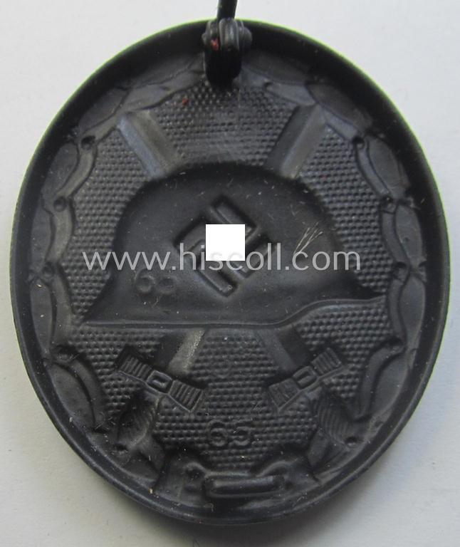 'Verwundeten-Abzeichen in Schwarz' being a clearly maker- (ie. '65'-) marked example by the: 'Klein & Quenzer'-company that came stored its (scarcely seen!) period pouch