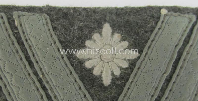 WH (Heeres) 'Armwinkel' (or: arm-chevron) as executed on typical field-grey-coloured wool as was specifically intended for usage by a soldier with the (unusually seen!) rank of: 'Stabsgefreiter'
