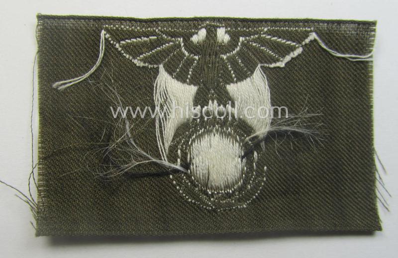 Unusually found - early period! - HJ (ie. 'Hitlerjugend') side-cap-eagle (ie.: 'Adler für HJ-Feld- o. Schiffchen-Mütze') as executed in neat 'BeVo'-weave-pattern onto a browish- ie. typical tan-coloured background