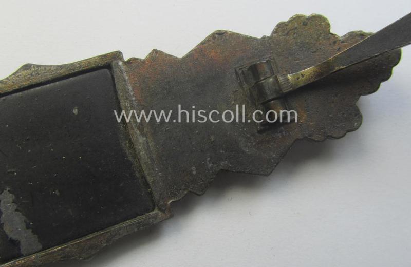 'Nahkampfspange in Bronze' (or: bronze-class close-combat clasp ie. CCC) being a maker- (ie. 'F.&B.-L.'-) marked- and/or minimally converse-shaped specimen as was produced by the maker- (ie. 'Hersteller') 'Funcke u. Brüninghaus'