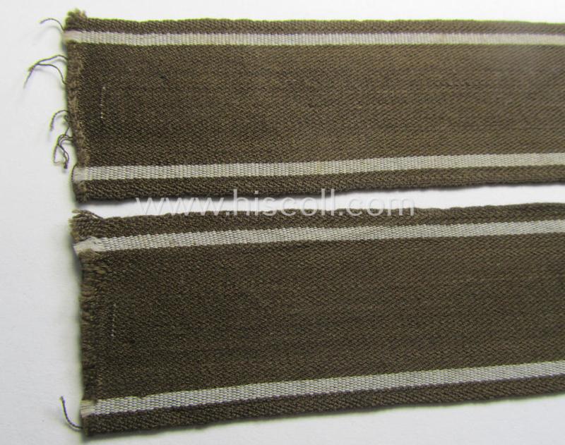 Superb - and scarcely encountered! - example of a WH (Heeres) cuff-title ie. armband (ie. 'Ärmelstreifen') entitled: 'Feldgendarmerie' (being a typical 'semi-BeVo'-woven!) example that comes in a full length- ie. non-shortened, condition