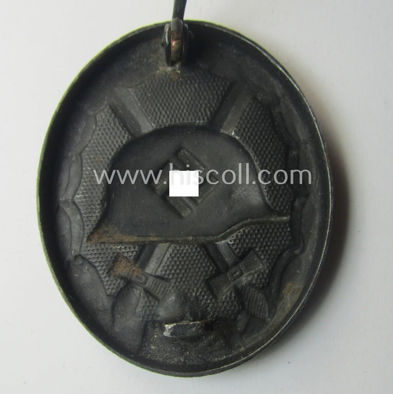 Neat - albeit non-maker-marked and magnetic! - example of a black-class wound-badge (or: 'Verwundeten-Abzeichen in Schwarz') that comes in an overall nice- (ie. I deem just minimally used-), condition