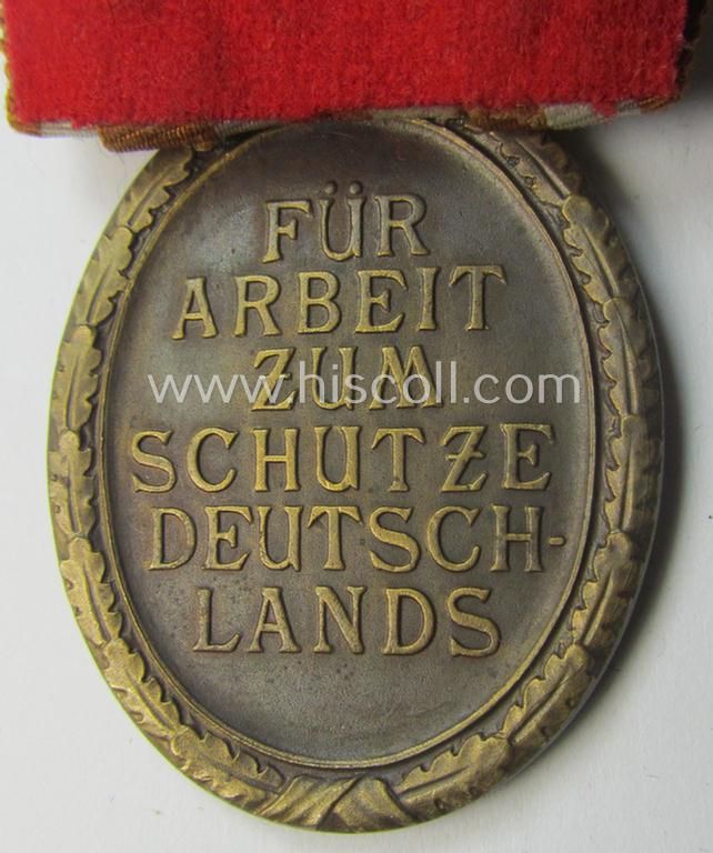 Single-pieced, non-detachable WH medal-bar (ie. 'Orden- o. Einzelspange') showing a: 'Deutsches Schutzwall Ehrenzeichen' (aka: 'Westwall'-medal)