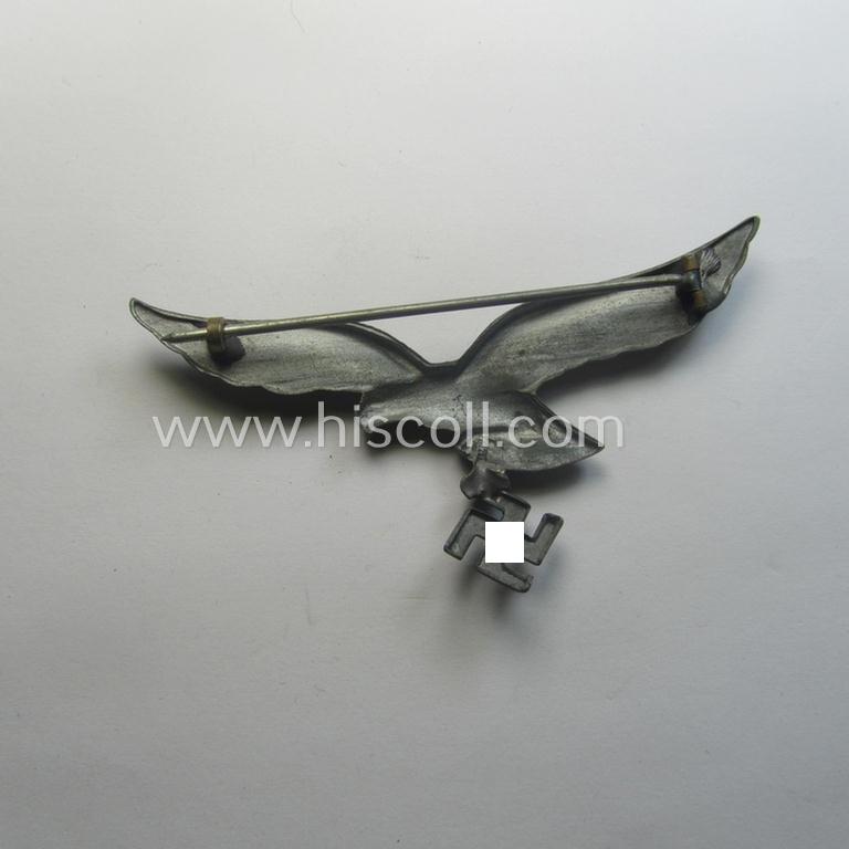WH (Luftwaffe) zinc- (ie. 'Feinzink'-) based breast-eagle as was specifically intended for usage on the white summer-tunics (ie. 'Brustadler für Sommerrock') being a detailed- and maker- (ie. 'A'-) marked specimen