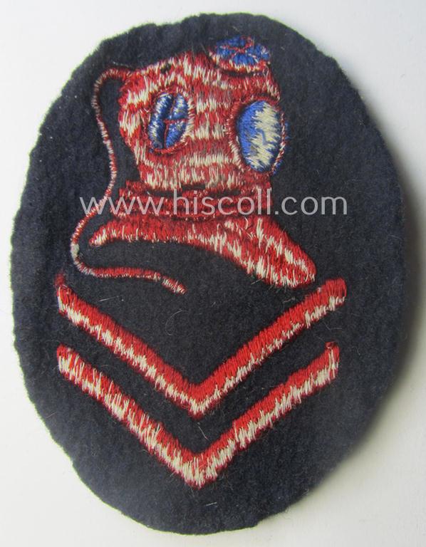 WH (Kriegsmarine) neatly machine-embroidered, so-called: career- ie. specialist-armbadge (ie. 'Tätigkeits-Abzeichen') as was intended to signify the: 'Sonderausbildung für Torpedotaucher'