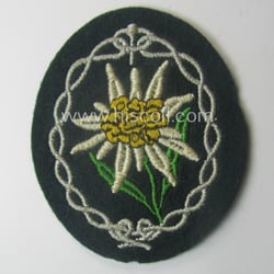 WH (Heeres) EM- (ie. NCO-) type: 'Edelweiss'-armpatch (being...