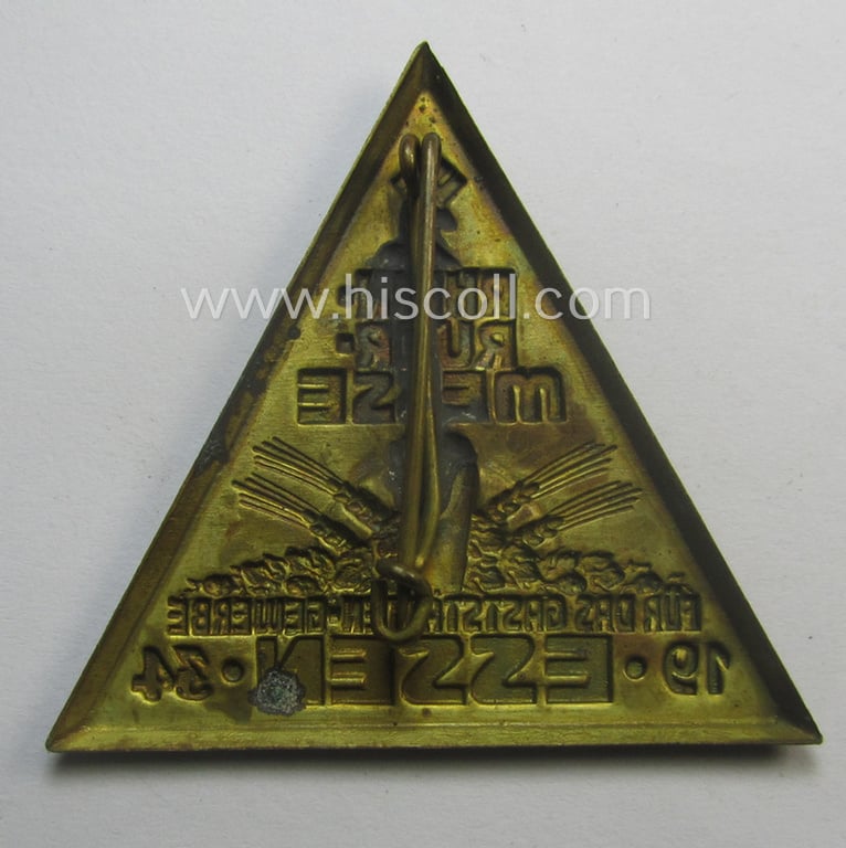 Commemorative, golden-bronze-coloured N.S.D.A.P.-related 'tinnie', being a non-maker marked example, depicting a small swastika and illustration of a pint of beer coupled the text: '2. Rhein-Ruhr-Messe für das Gaststätten-Gewerbe - Essen - 1934'