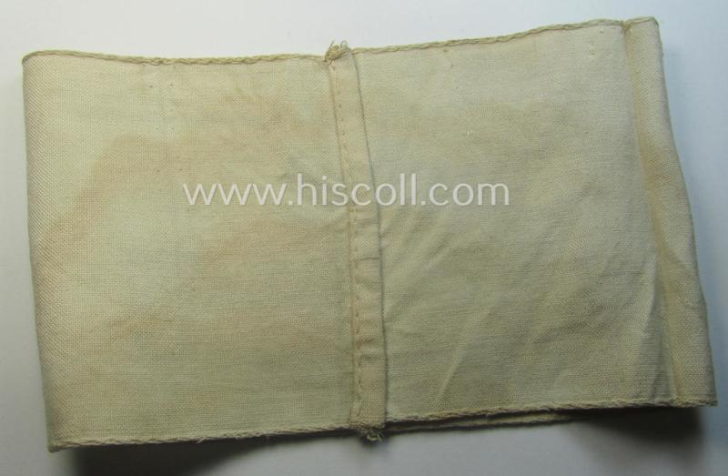 Beige-white-coloured- and/or linnen-based armband (ie. 'Armbinde') as was executed in the 'thicker-styled' fabric as was intended for WH (Heeres) staff-members working as: 'Hilfs-Krankenträger'