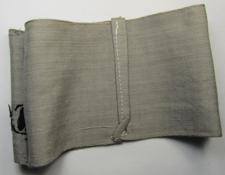 Attractive - and scarcely seen! - example of a DRB- (ie. 'Deutsche Reichsbahn'-) related armband entitled: 'Im Dienst der Deutschen Reichsbahn', being of the 'entirely-woven'-type in a technique similar to the 'BeVo'-weave pattern