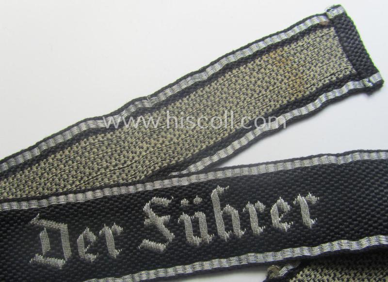 Truly used- and/or carefully tunic-removed example of a: Waffen-SS 1939/40-pattern, officers'-type 'flat-wire'-woven cuff-title (ie. 'Ärmelstreifen für Führer'): Regiment 'Der Führer' (2. SS-Pz-Div. "Das Reich")