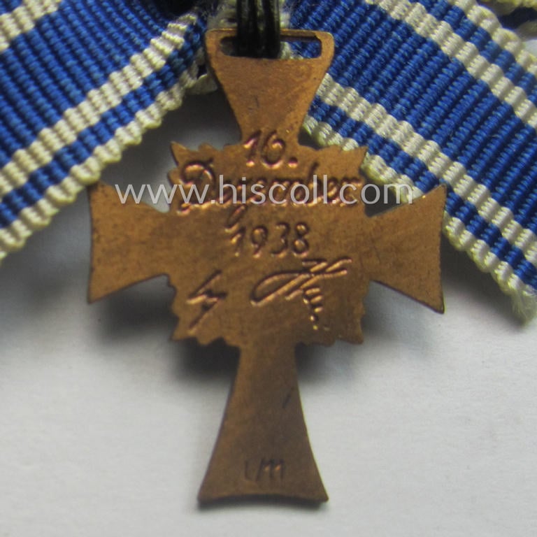 Miniature of an: 'Ehrenkreuz der deutschen Mutter - dritte Stufe' (or: bronze-class mothers'-cross) being a maker- (ie. 'L/11'-) marked example