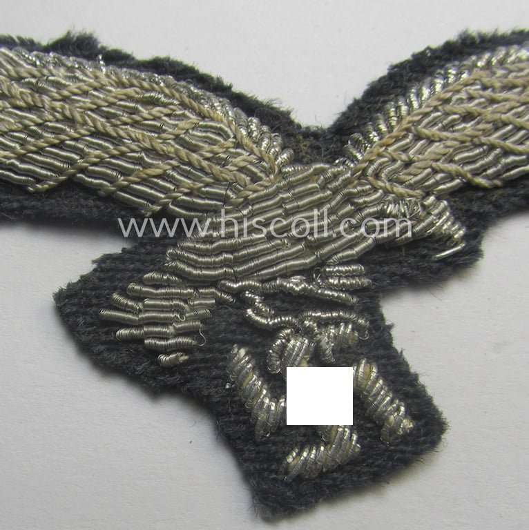 WH (Luftwaffe) officers'-pattern breast-eagle (ie. 'Brustadler für Offiziere der Luftwaffe') being a neatly hand-embroidered example of the: 'Extra Qualität' that comes in a moderately used- (ie. carefully tunic-removed-), condition