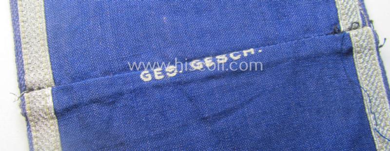 Darker-blue-coloured, RLB (or: 'Reichsluftschutzbund') so-called: 'Amtsträger-Armbinde für Führer' depicting the typical 'RLB'-logo (with lettering) and that comes in a moderately used- ie. worn, condition