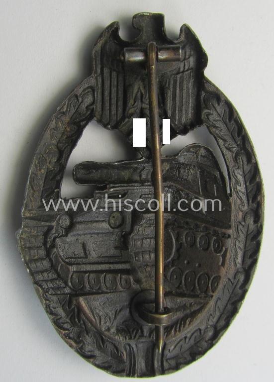 Attractive - and moderately used! - 'Panzerkampfabzeichen in Bronze' (or: bronze-class panzer-assault badge or PAB) being a non-maker-marked- and/or hollow zinc- (ie. 'Feinzink'-) based example as was produced by the: 'Wilh. Deumer'-company