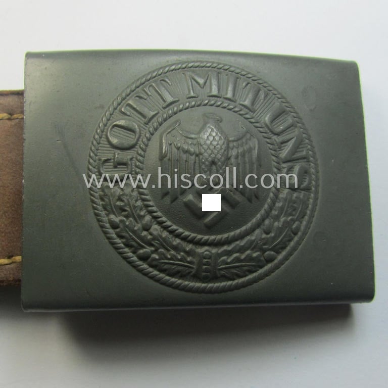'Virtually mint', 'standard-issue'-pattern, WH (Heeres) field-grey-toned- and steel-based belt-buckle being a maker- (ie. 'H.A.41'-) marked example that comes mounted onto its: 'H. Arld - Nürnberg'-marked and/or: '1942'-dated tab