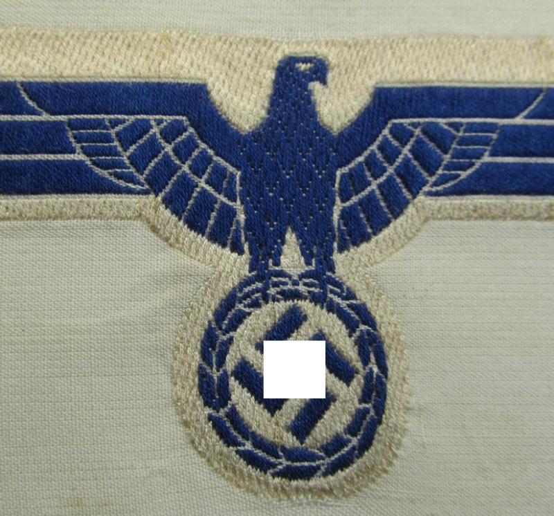 WH (KM) EM- (ie. NCO-) type breast-eagle (ie. 'Brustadler für Mannschaften u. Uffz. der Kriegsmarine') as executed in the 'BeVo'-weave-pattern on a white-coloured background as was specifically intended for usage on the various white-coloured tun...