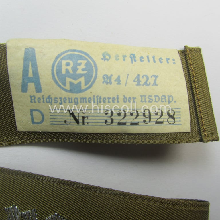 Superb - full length and 'flat-wire'-woven! - 'N.S.D.A.P.'- (ie. 'Politische Leiter'-) related cuff-title (ie. 'Ärmelstreifen') entitled: 'Ordensburgen' (being a 'virtually mint- ie. unissued' example that still retains its 'RzM'-etiket)
