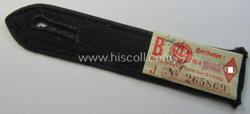 Neat - and naturally single! - black-piped 'DJ- o. Deutsches Jungvolk' shoulderstrap as was intended for usage by a: 'DJ-Mitglied' who served within the: 'Bann 310' (310 = 'Donau') and that comes with its period-attached 'RzM'-etiket
