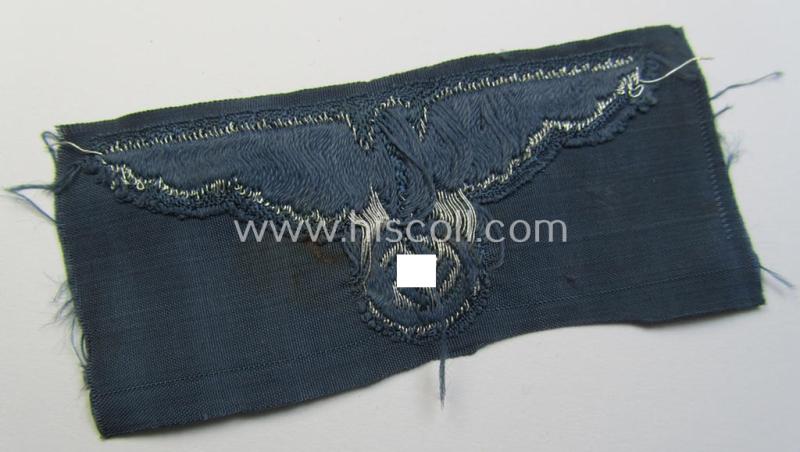 Superb, BZP (ie. 'Bahnschutz-Polizei') officers'-/ie. NCO-type side-cap- (ie. 'Schiffchen'-) eagle as woven in 'flat-wire-BeVo'-style and executed in bright-silver thread on a greyish-blue-coloured and linnen-based background