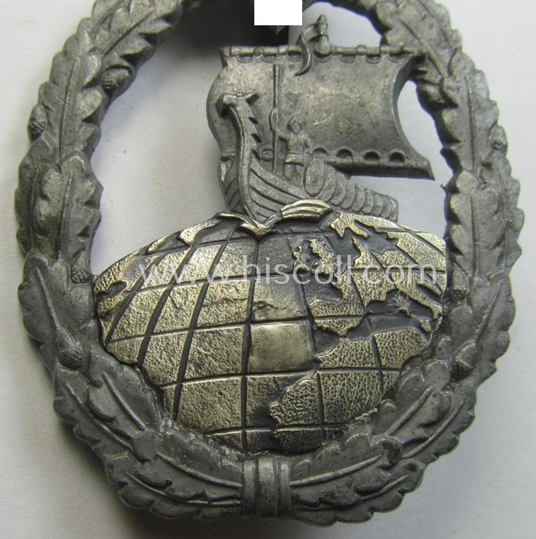 WH (KM) 'Hilfskreuzer-Kriegsabzeichen' (or: auxiliary-cruiser war-badge) being a typical, non-maker-marked- and/or: 'Feinzink'-based example as was produced by the: 'S&L'-company