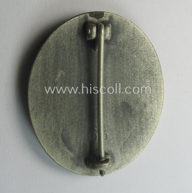 Silver-class wound-badge (or: 'Verwundeten-Abzeichen in Silber') being a maker- (ie. '65'-) marked example as was produced by the 'Hersteller' ie. maker: 'Klein u. Quenzer'