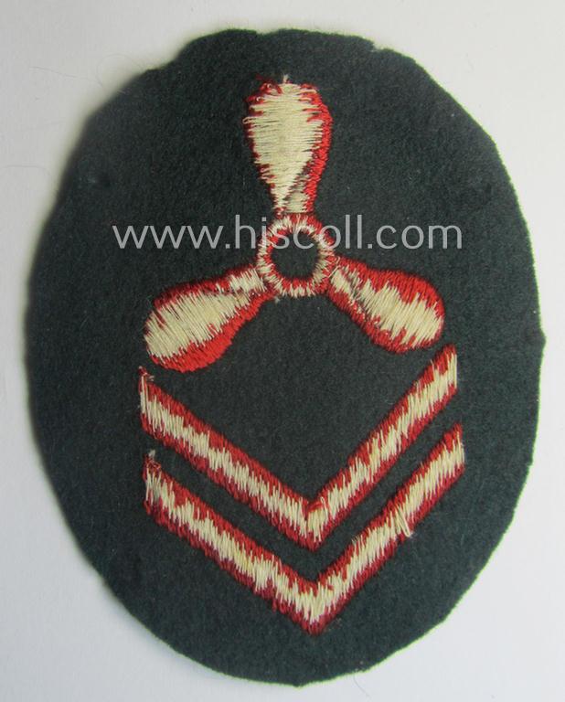 WH (Kriegsmarine) machine-embroidered career- ie. specialist-armbadge (ie. 'Tätigkeits-Abzeichen') as intended for usage by a: 'Küstenartillerie'-staff-member who succesfully completed a: 'Motoren-Lehrgang II'