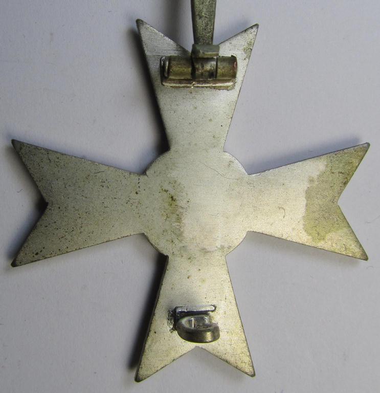 Luxuriously-styled, 'Kriegsverdienstkreuz 1. Klasse ohne Schwertern' being an attractive and maker- (ie. '50'-) marked specimen that is executed in typical, silverish-coloured metal (ie. 'Buntmetall') and that comes in a moderately used conditi...