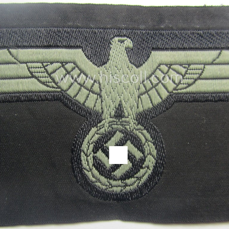 Later- (ie. mid-war-) period, WH (Heeres) 'Panzer'-type breast-eagle (ie. 'Brustadler für Panzertruppen') being a 'virtually mint- ie. unissued' example as executed in bluish-grey-coloured linnen on a black-coloured background