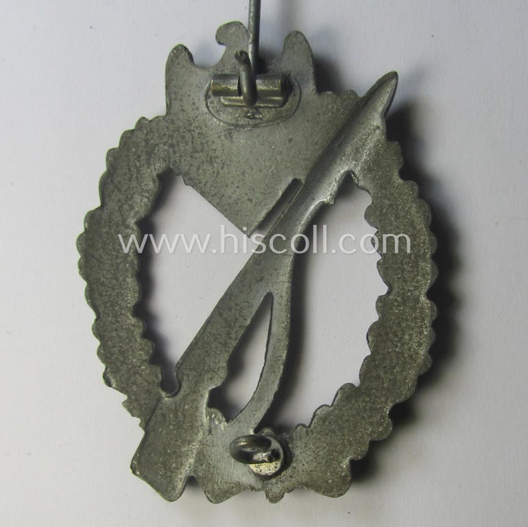 'Infanterie Sturmabzeichen in Silber' being a scarcely seen, non-maker-marked- and/or zinc- (ie. 'Feinzink'-) based specimen as was presumably procuded by the desirable: 'Ernst L. Müller'-company