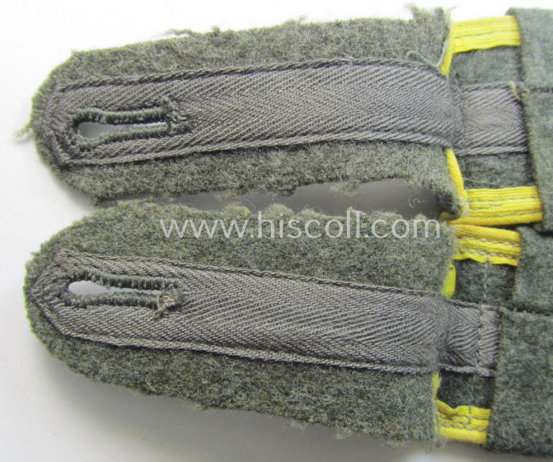 Pair of later-war-period, WH (Heeres) so-called: 'M44'-styled ie. 'simplified', EM-type shoulderstraps having a pair of 'A'-'Überschuben' attached as intended for a: 'Soldat eines Nachr.-Rgts. o. Abts.'