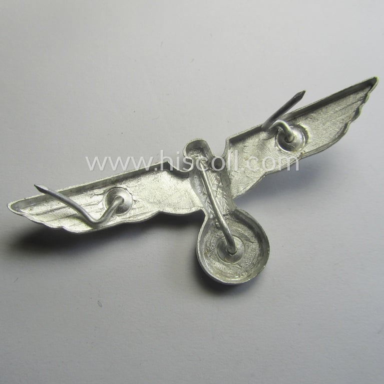 WH (Heeres) bright-silver-toned (ie. aluminium-based), EM- (ie. NCO- or officers') type visor-cap-eagle being a non-maker-marked example that comes in a minimally used- ie. (I deem) once cap-attached, condition