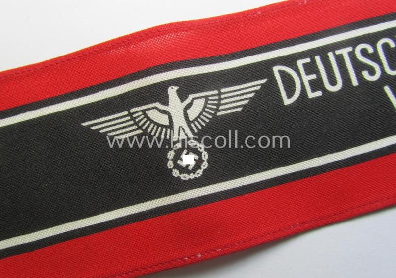 Superb, typically printed- and/or later-war-period, bright-red- and/or black-coloured so-called: 'Deutscher Volkssturm'-armband (ie. 'Armbinde') that comes in an overall very nice- (I deem hardly used- nor worn- ie. 'virtually mint'-), conditio...