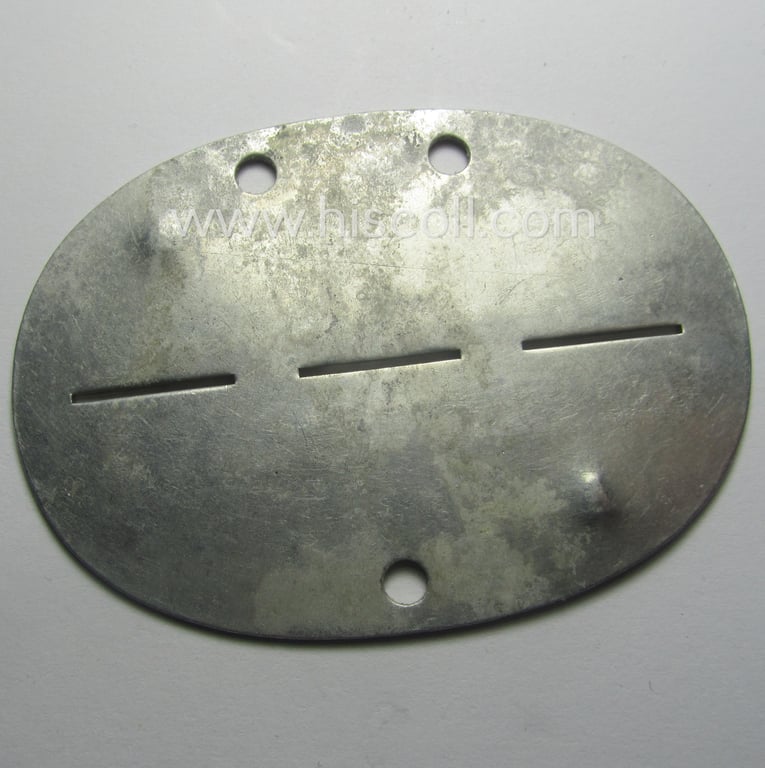 Aluminium-based, WH (Heeres) ie. 'Infanterie'-related ID-disc that shows the stamped unit-designation: '4/Inf.Ers.Btl. 76'