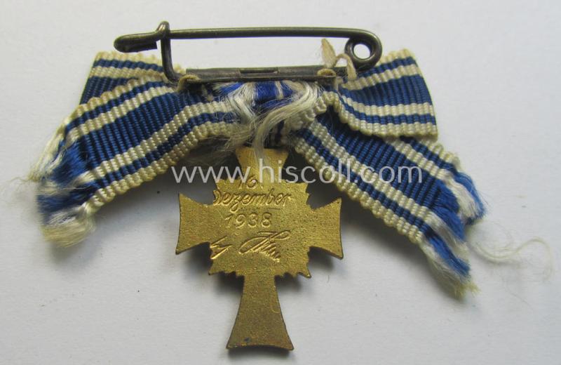 Miniature of an: 'Ehrenkreuz der deutschen Mutter - erste Stufe' (or: golden-class mothers'-cross) being a non-maker-marked example that comes in an overall nice- (albeit moderately worn- ie. used-), condition