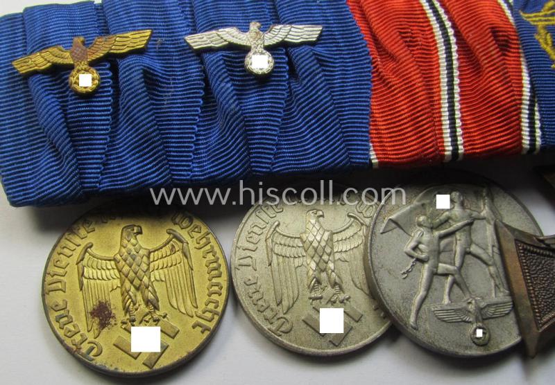 Attractive, 4-pieced medal-bar (ie. 'Ordenspange') showing two WH (Heeres or KM) so-called: 'DA für 4 u. 12 Jahre treue Dienste', an: Austrian 'Anschluss'-medal and a (scarce!): 'Zollgrenzschütz-Ehrenzeichen' (or: customs loyal-service medal)