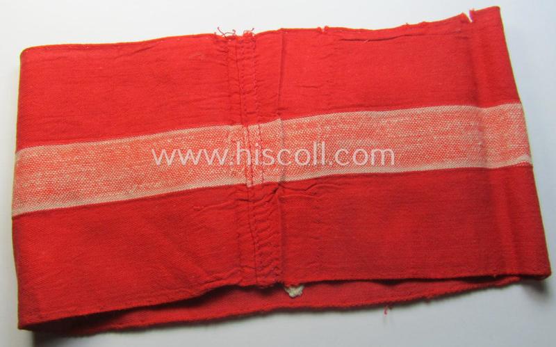 'Standard-issued'-pattern (ie. entirely woven) pattern, bright-red-coloured HJ- (ie. 'Hitlerjugend'-) related armband (ie. 'Armbinde') being a moderately worn- ie. used example that misses its 'RzM'-etiket