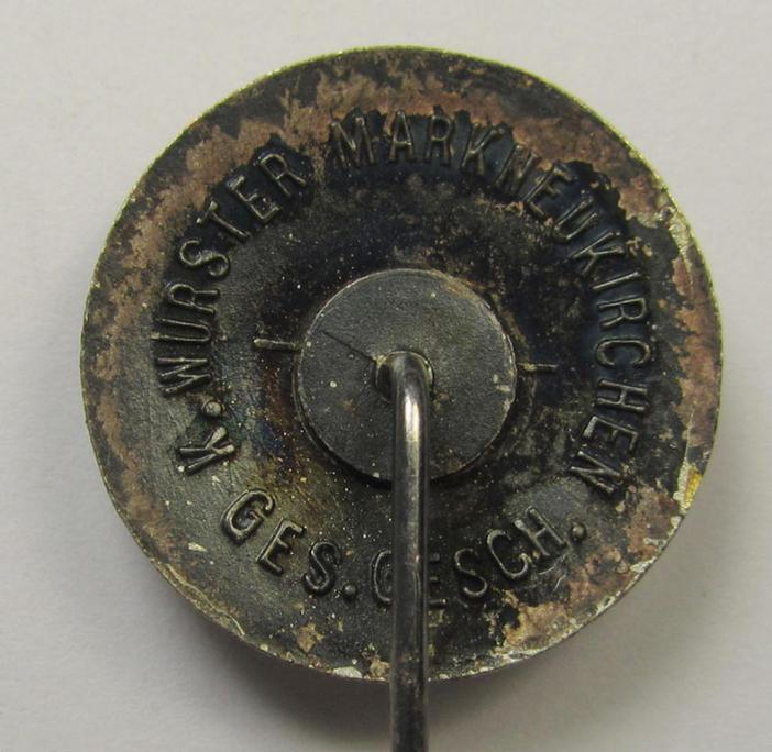 Rarely seen, neatly namelled 'RLB'- (ie. 'Reichluftschützbund') 'Amtsträgerabzeichen in Gold' (or: gold-class civil-attire badge of the first pattern) that is neatly maker- (ie. 'K. Würster'-) marked and bearing a patent-pending-designation