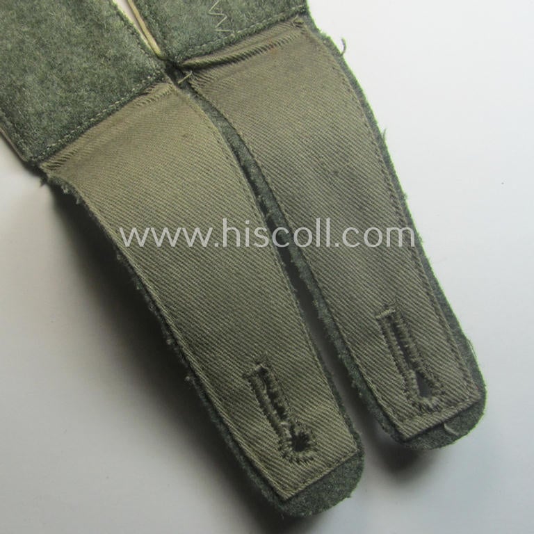 Pair of WH (Heeres), early- (ie. mid-) war-period- (ie. 'M40- o. M43'-) pattern EM-type shoulderstraps as piped in the white-coloured branchcolour as was intended for a: 'Soldat eines Infanterie-Rgts.'