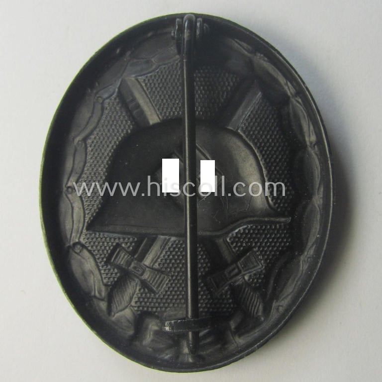 'Verwundeten-Abzeichen in Schwarz' (or: black-class wound-badge) being a neatly maker- (ie. '100'-) marked example as was produced by the: 'Rudolf Wächtler u. Lange'-company