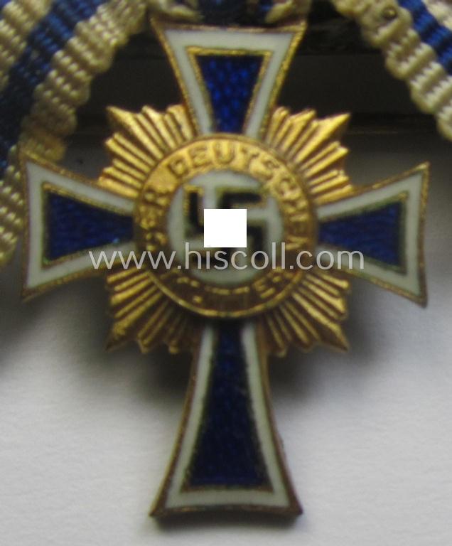 Miniature of an: 'Ehrenkreuz der deutschen Mutter - erste Stufe' (or: golden-class mothers'-cross) being a maker- (ie. 'L/15'-) marked example