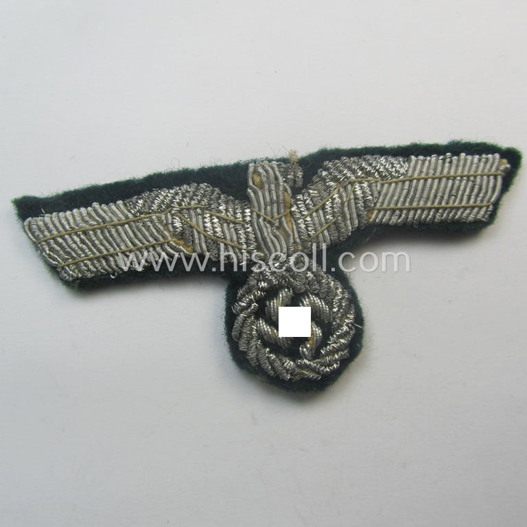 Clearly used- and/or cap-removed, WH (Heeres) officers'-pattern, visor-cap eagle/cocarde-set (ie. 'Effektensatz für Schirmmütze') being both hand-embroidered examples that come mounted onto a darker-green-coloured- and/or woolen-based background