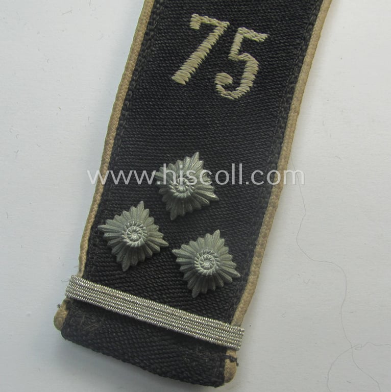 Single - and scarcely found! - white-piped, so-called: 'Reiter-HJ' (ie. 'HJ-Streifendienst') shoulderstrap as was intended for usage by a: 'HJ-Obergefolgschaftsführer' as attached to the: 'Bann 75' (= 'Bann Bremen' in the 'Gebiet Nord Nordsee')