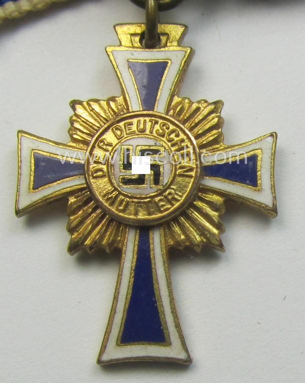 Miniature of an: 'Ehrenkreuz der deutschen Mutter - erste Stufe' (or: golden-class mothers'-cross) being a maker- (ie. 'L/57'-) marked example