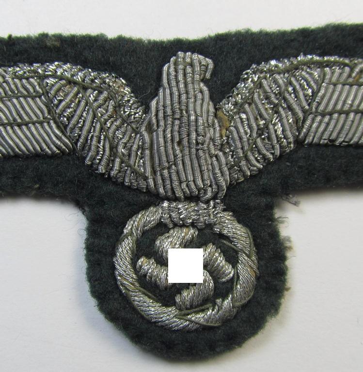 WH (Heeres) officers'-type, hand-embroidered breast-eagle (ie. 'Brustadler für Offiziere') as was executed in bright-silverish-coloured braid on a darker-green-coloured background as was intended for usage on the various officers'-pattern tunics