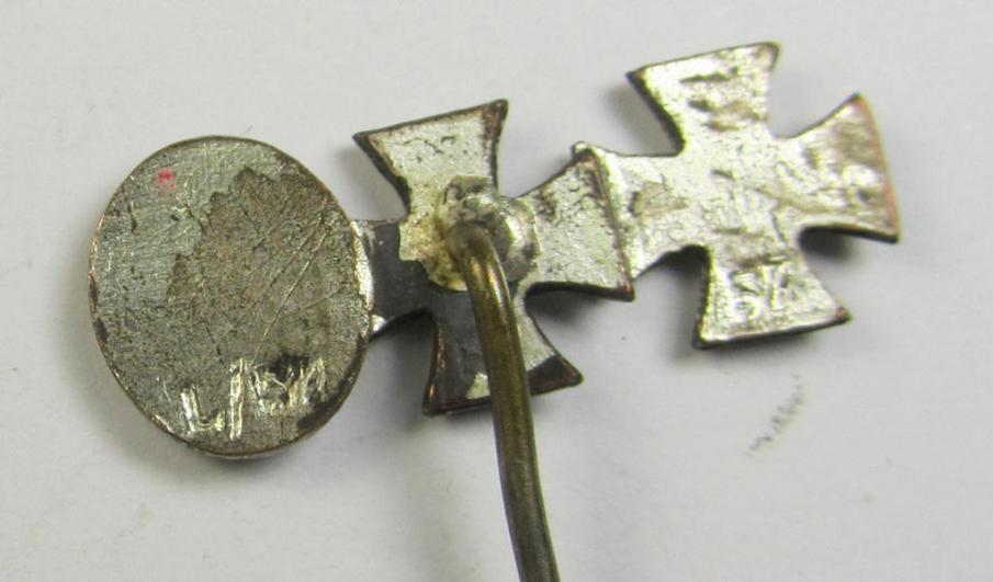 Detailed, 9-mm.-sized medal-lapel-pin, being a maker- (ie. 'L/57'-) marked example depicting respectively: an 'EK I. Klasse', an: 'EK II. Klasse' and a: 'Verwundeten-Abzeichen in Silber'