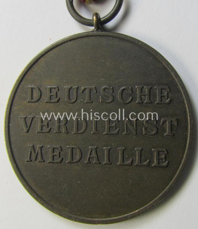 Superb - and truly scarcely found! - example of a: 'Deutsche Bronzene Verdienstmedaille des Deutschen Adler Ordens ohne Schwertern' being a nicely maker- (ie. '30'-) marked example